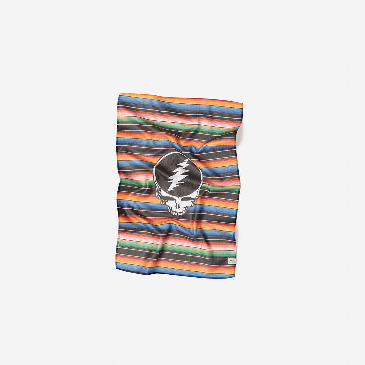 Blanket with vintage stripes and central black-and-white skull and lightning bolt design.