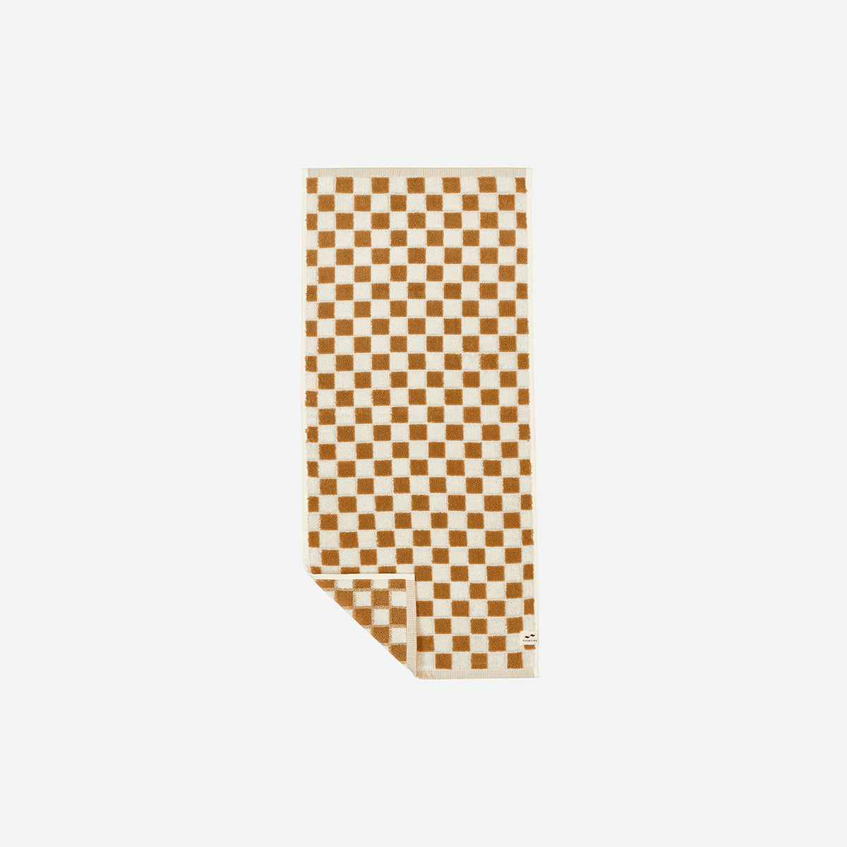 Towels with brown and beige checkered pattern, absorbent, folded for display.