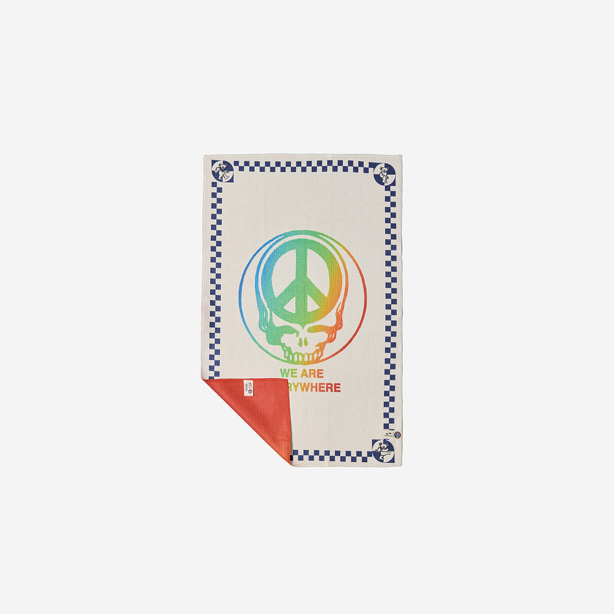 Blanket, beige recycled waffle microfiber with rainbow peace skull and We Are Everywhere text.