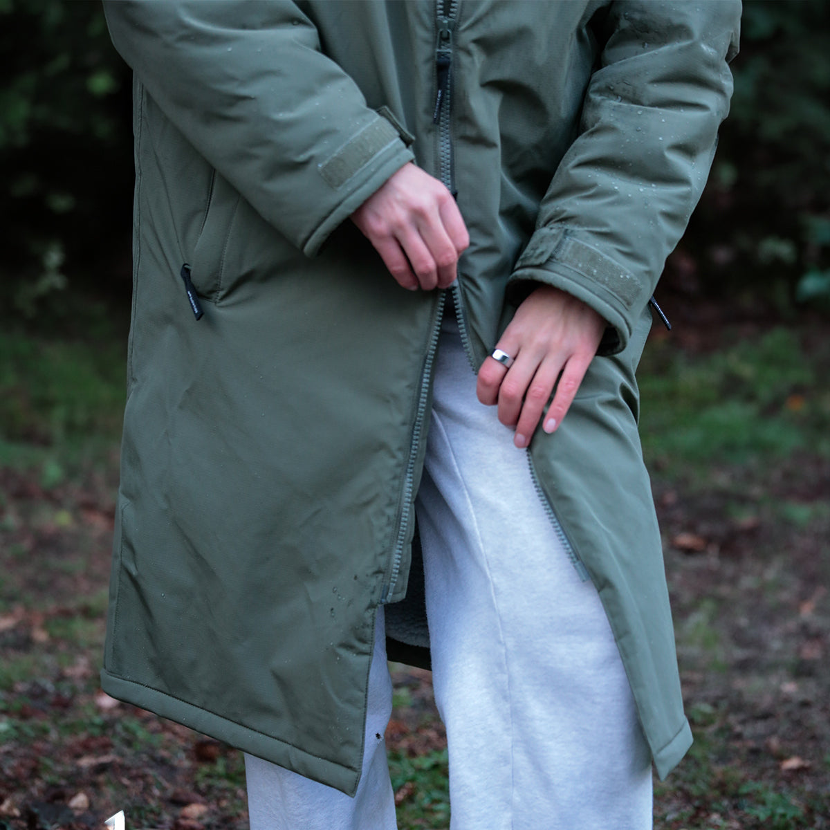 Waterproof green coat and gray pants set.