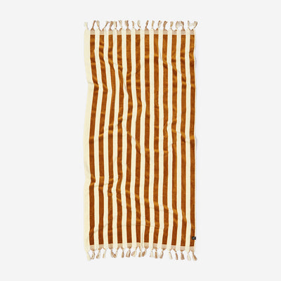Striped woven towel with brown and beige pattern, fringed edges on both sides.