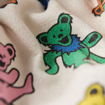 Quick-dry towel made from recycled materials with colorful cartoon bear pattern.