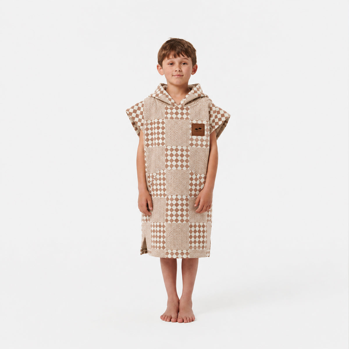 Changing robe towel poncho in beige and white cotton checkerboard print.