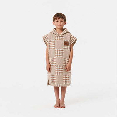 Changing robe towel poncho in beige and white cotton checkerboard print.