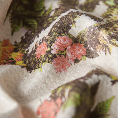 Waffle towel, recycled material, floral pattern with pink flowers and green leaves.