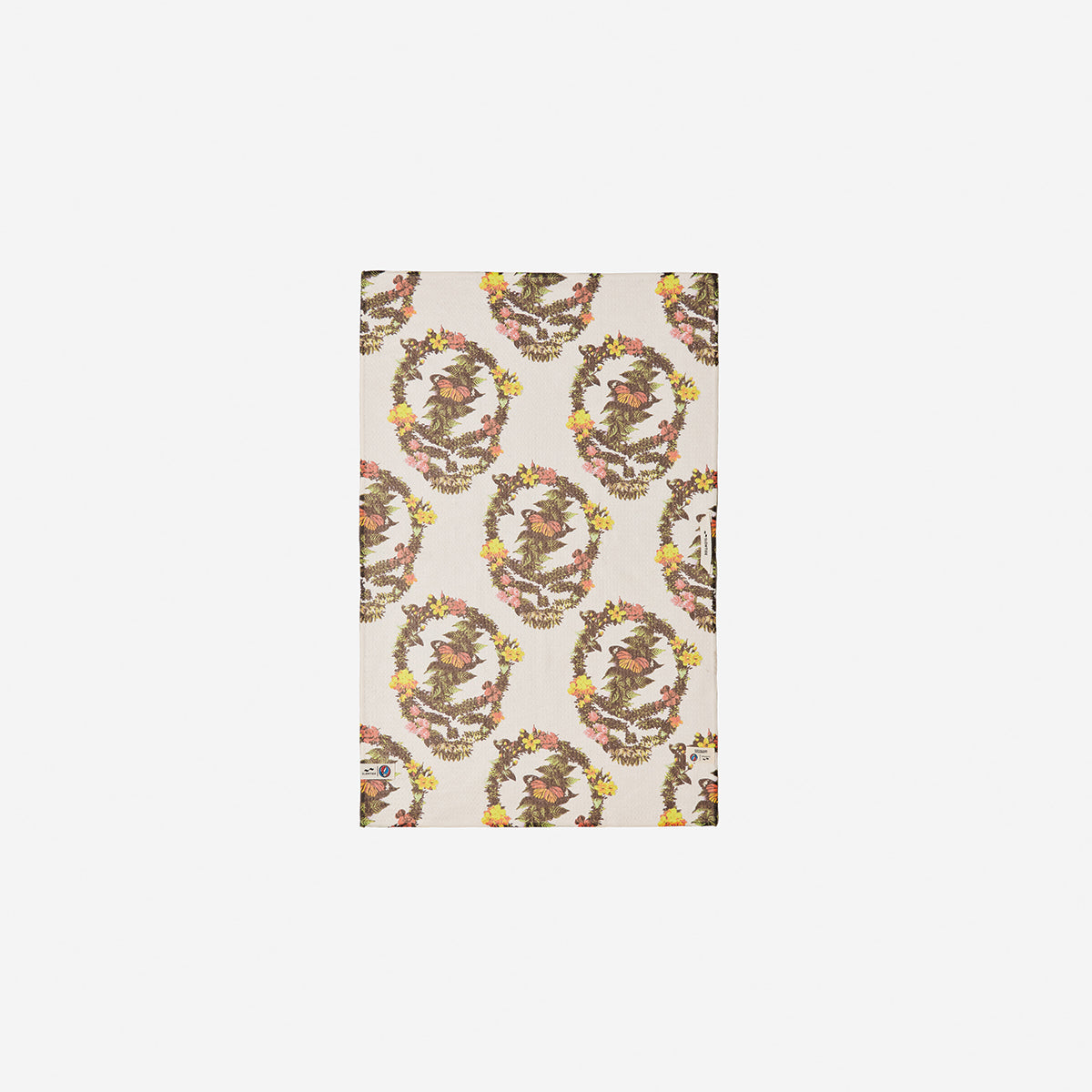 Kitchen towel, beige cotton with brown, yellow, and orange botanical print on fabric.