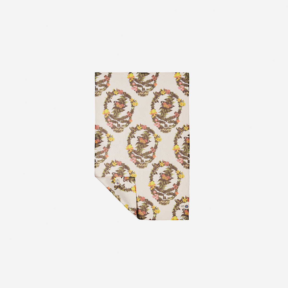 Kitchen towel with beige floral botanical print, partially folded on white background.