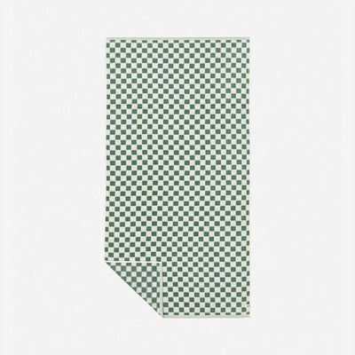 Oversized cotton towel with green and white checkered pattern, one corner folded over.