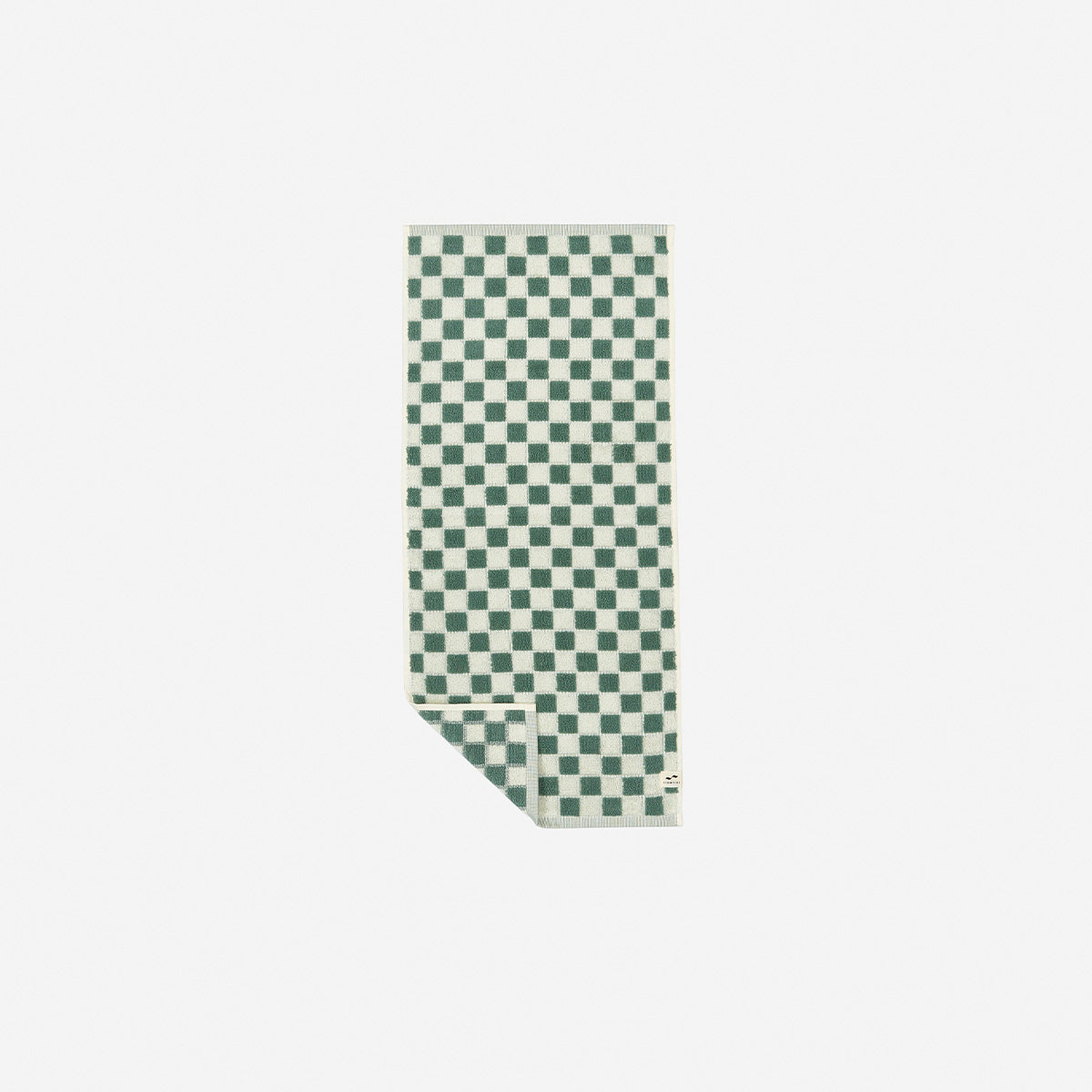 Oversized cotton towel with green and white checkered pattern.