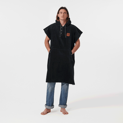Black cotton terry towel poncho with heavyweight texture.