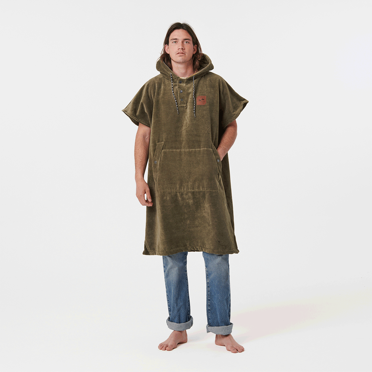 Olive green heavy cotton terry changing poncho with front pocket.