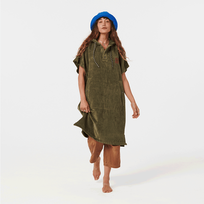 Green absorbent towel poncho with hood.