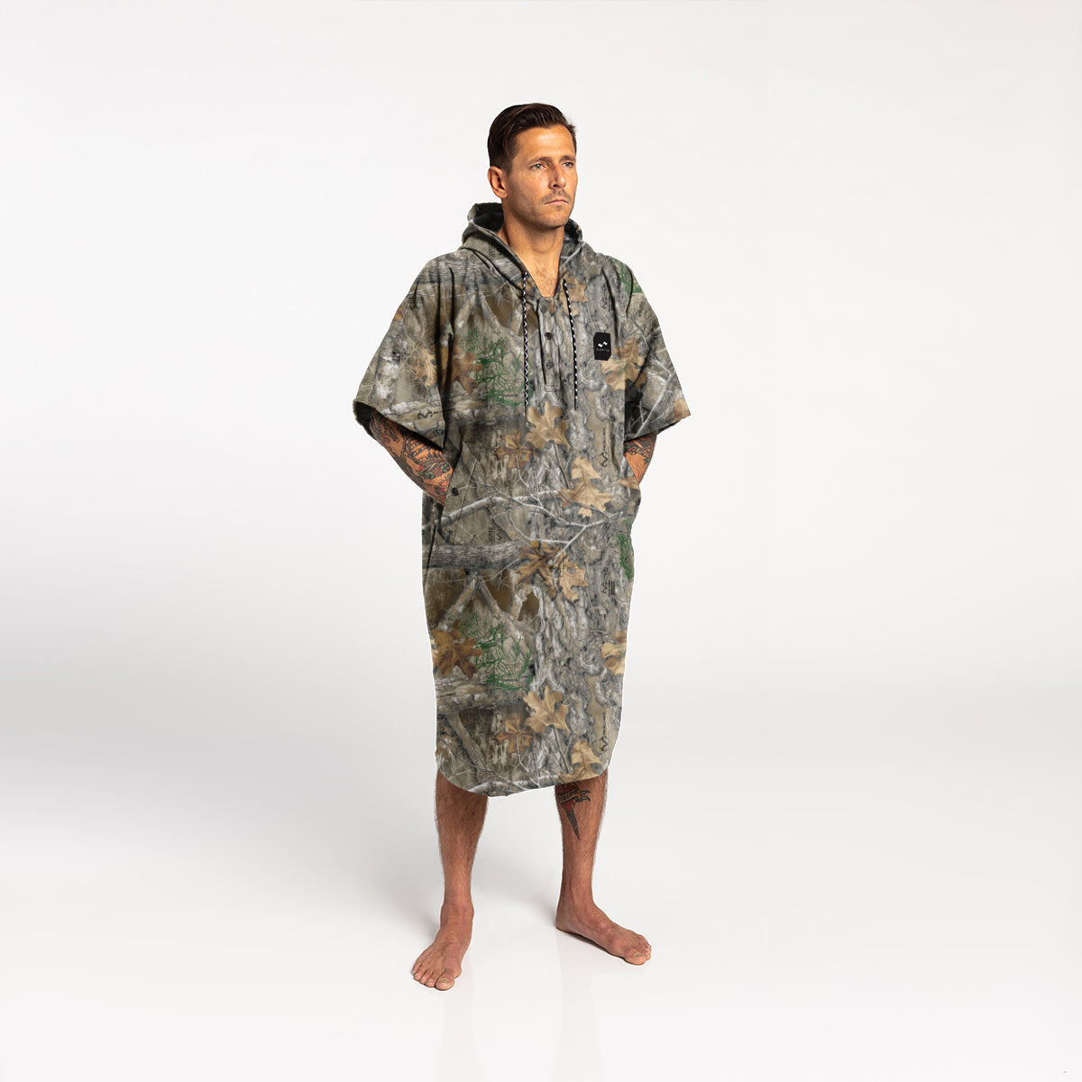 Poncho, quick-dry microfiber with camouflage pattern, displayed for outdoor use.
