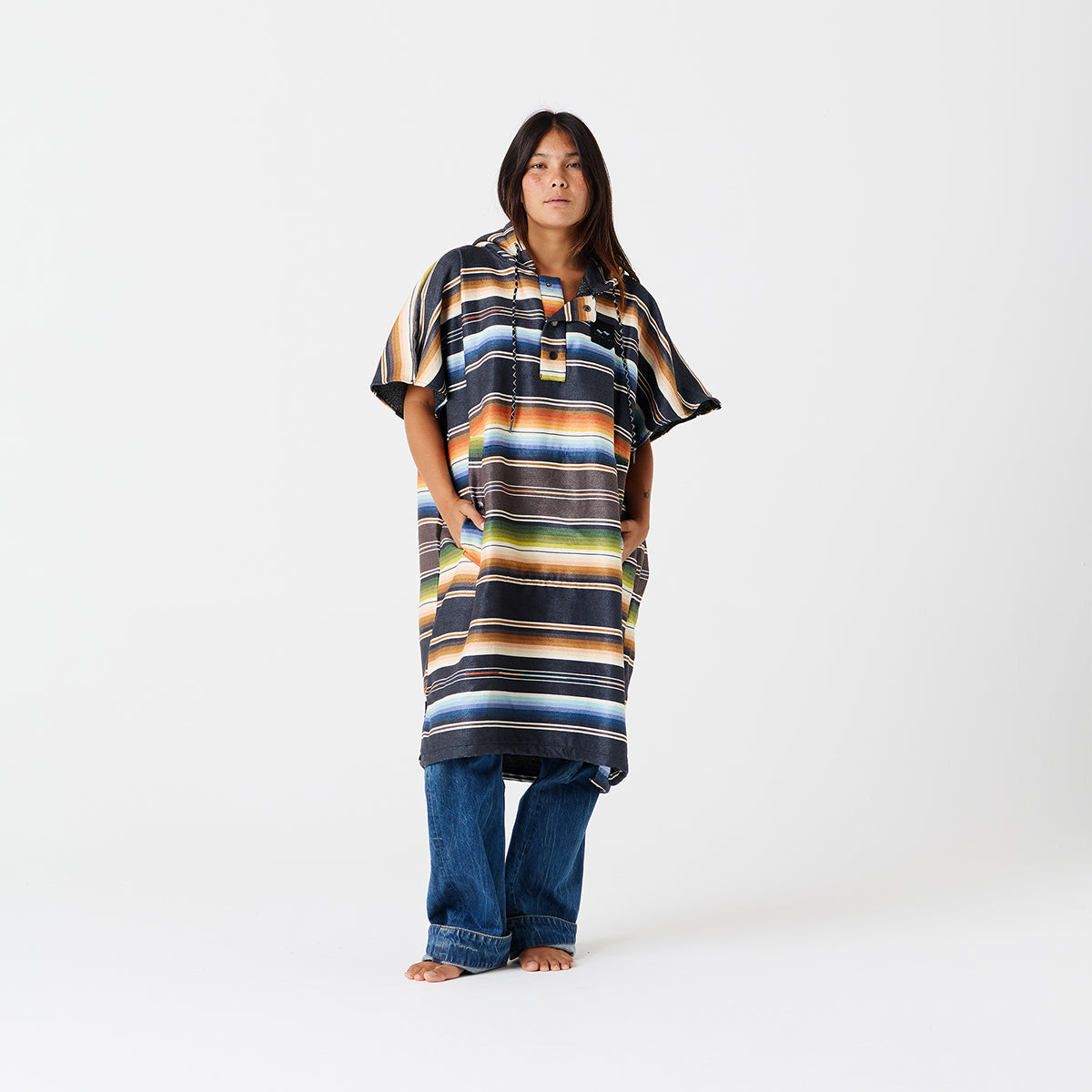 Striped quick-dry changing poncho with hood, ideal for surf or beach use.