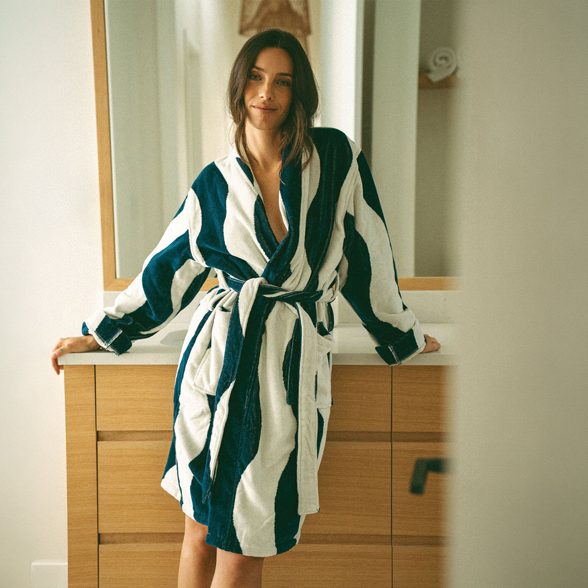 Terry cloth robe in navy and white stripes.