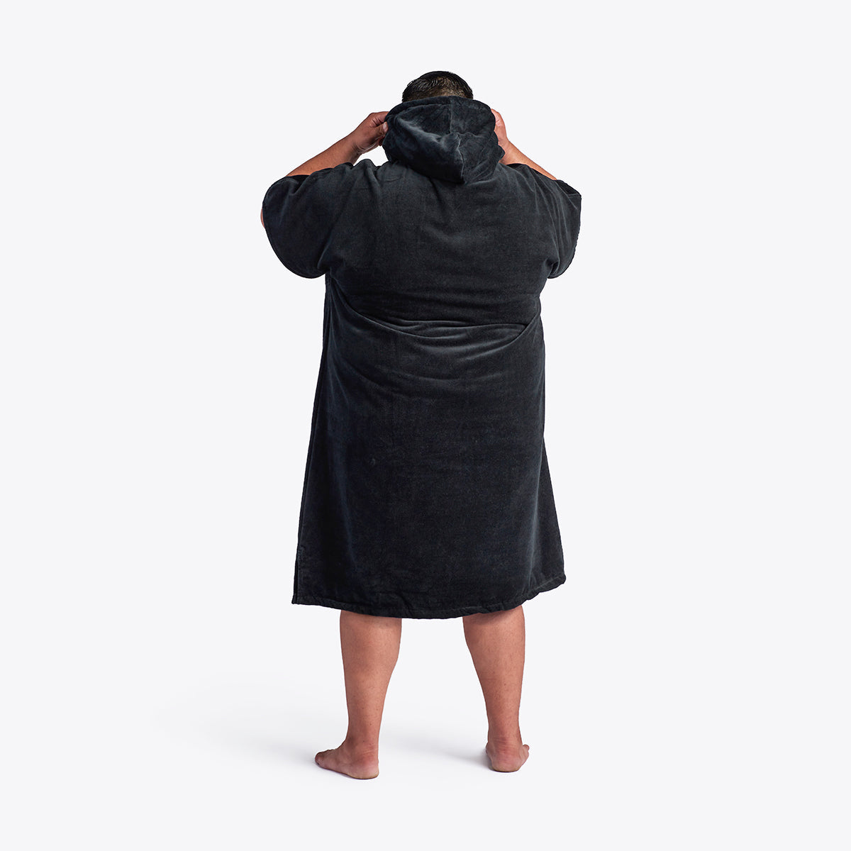 Black heavyweight cotton terry hooded changing poncho.