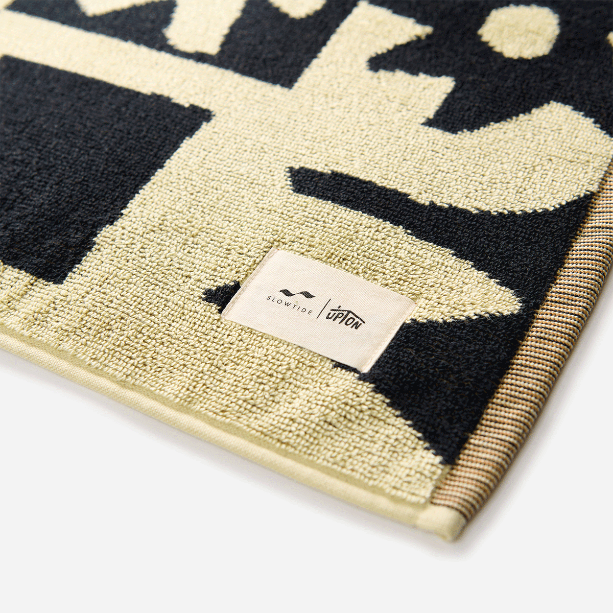 Cotton towel, absorbent, sustainably sourced, close-up.