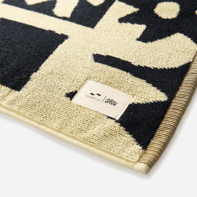Cotton towel, absorbent, sustainably sourced, close-up.
