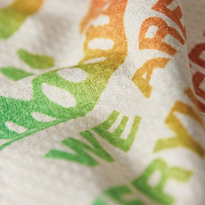 Kitchen towel, recycled waffle microfiber, bold text detail.