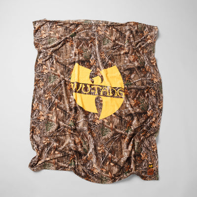 Fleece throw blanket with camo pattern and large yellow logo at center.