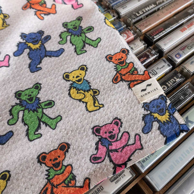 Microfiber towel with a colorful Dancing Bears pattern.