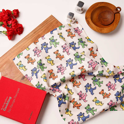 Quick-dry kitchen towel with a colorful dancing bear pattern.