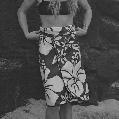 Wrap skirt in recycled towel fabric featuring a large hibiscus floral print.