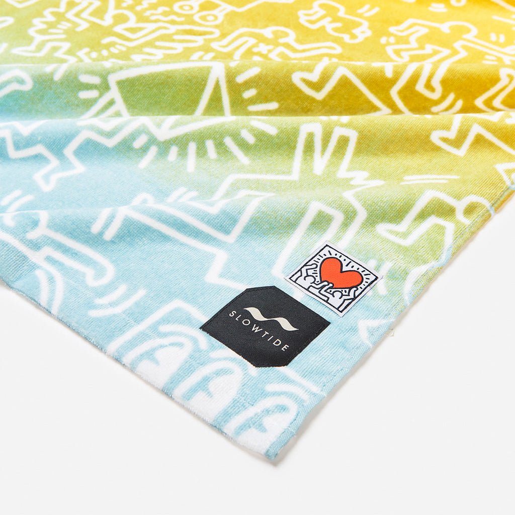 Sunset In The Village Beach Towel - Slowtide